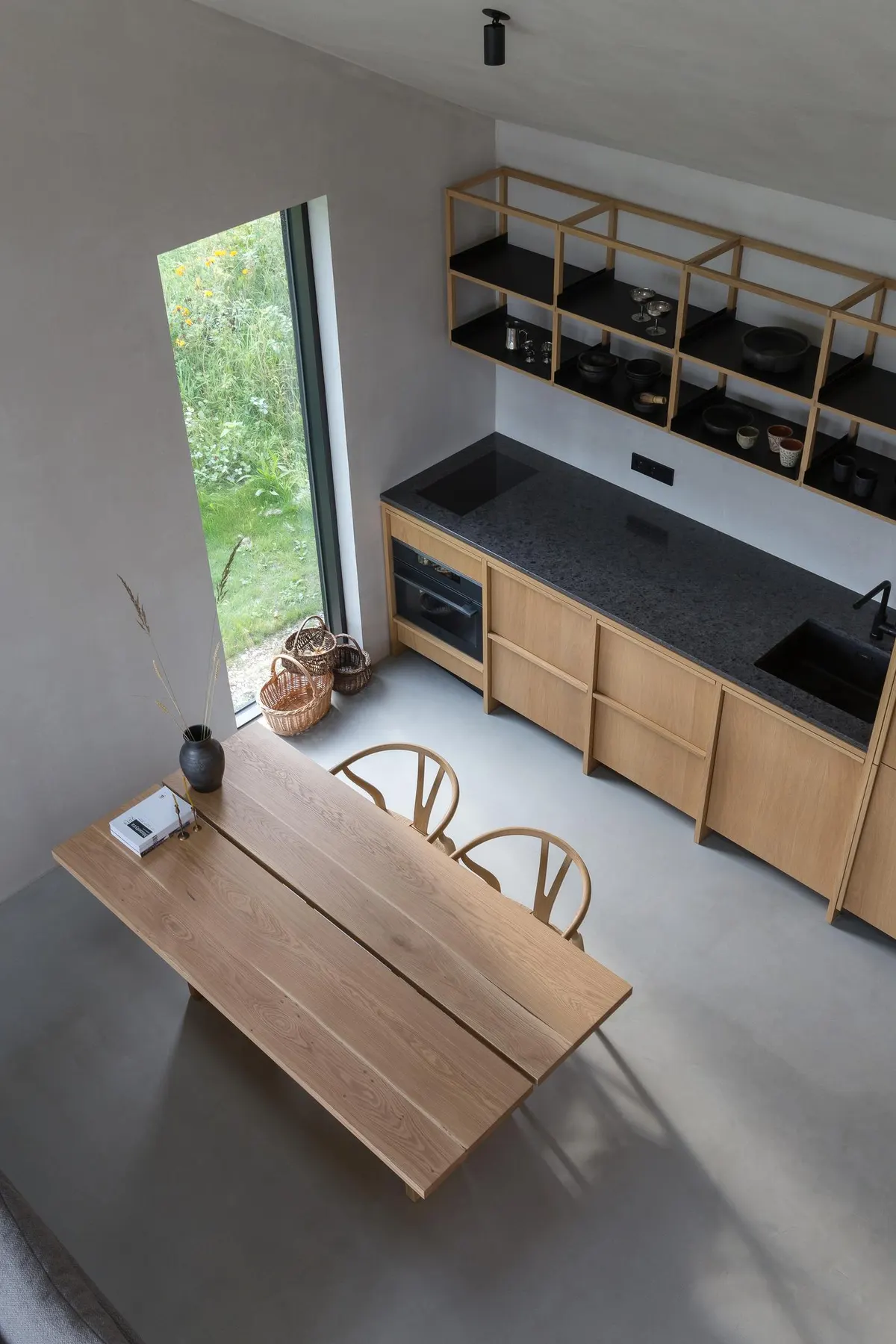 Oak kitchen with a long dining table